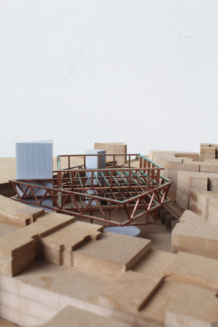 1/16" scale structural model showing stacked trusses and cores.