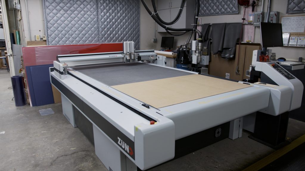 Photo of Zund machine in room L33 of Gund Hall.