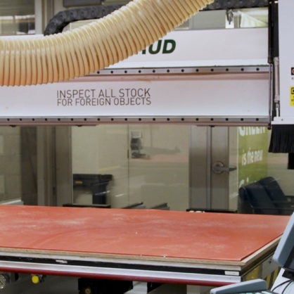 Photo of C.R. Onsrud CNC Router at the GSD, with control console in the foreground.