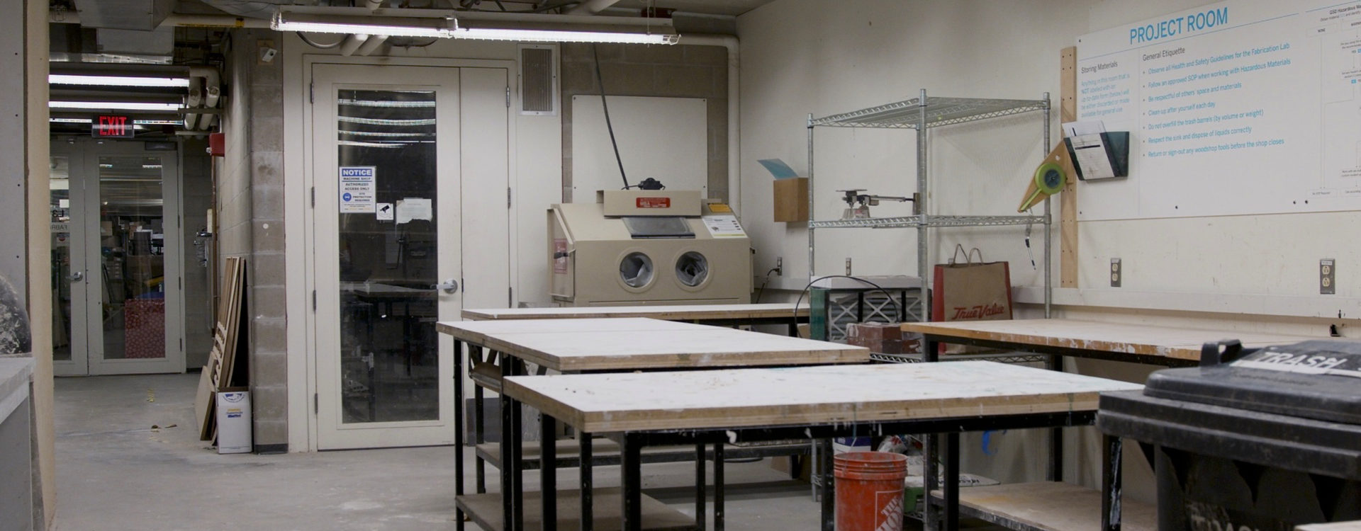 Photo of Project Room (Gund L31) showing worktables, metal shop, liquid disposal area, and abrasive cabinet.