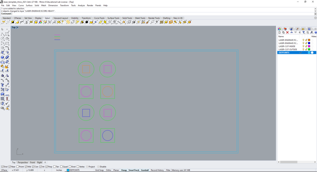 A laser-cutting file in Rhino showing 18 inches by 32 inches laser bed and cutting and engraving lines set to different colors.