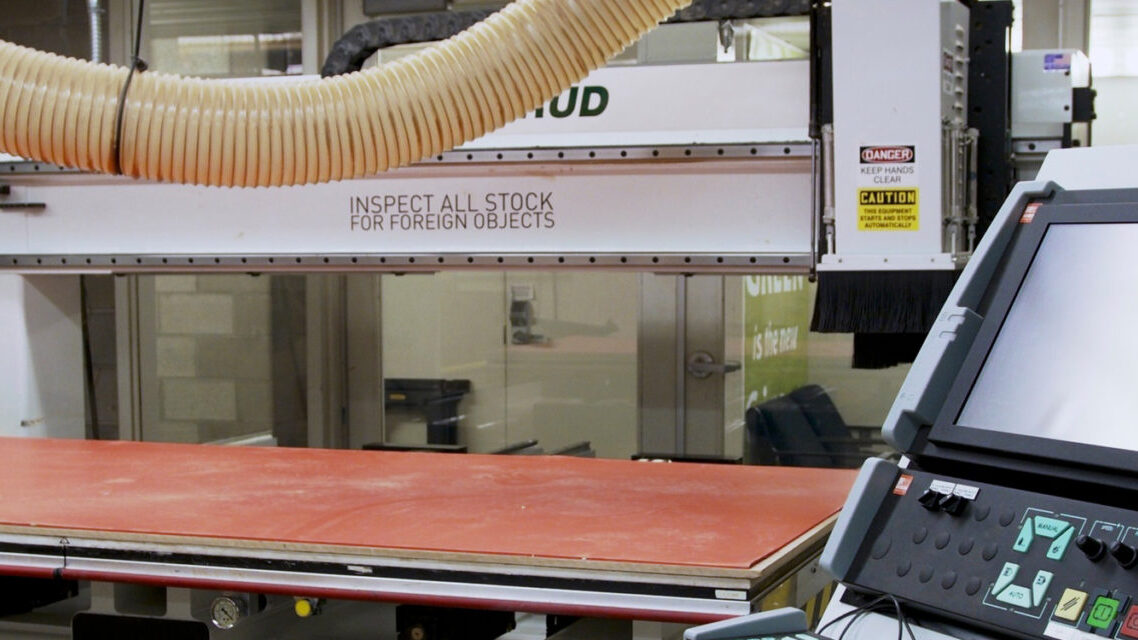 Photo of C.R. Onsrud CNC Router at the GSD, with control console in the foreground.