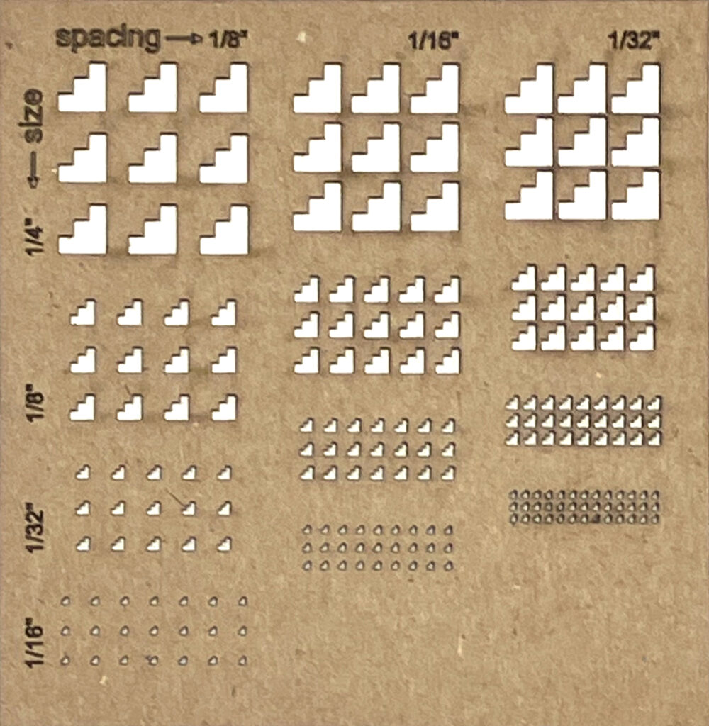 A stair-stepped shape cut in chipboard at different sizes and arrayed at decreasing densities.